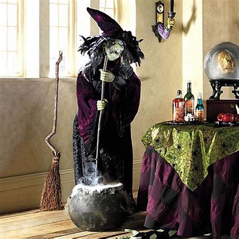 Witch stirring cauldron animatronic